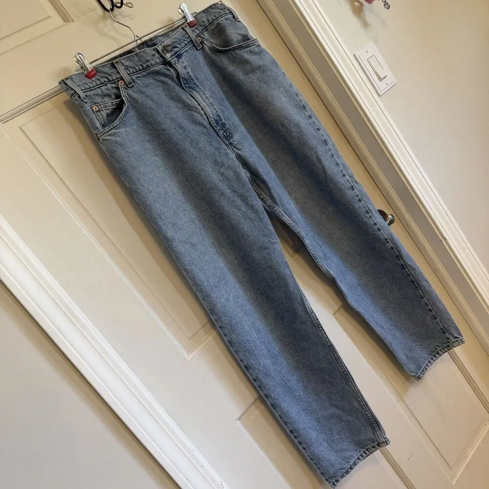Vintage Levi’s 550 Jeans Men’s 38x30 Relaxed Fit Tapered Leg Light Wash orange